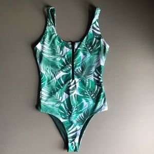 Reversible green one piece swimsuit with zipper